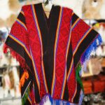 typical-peruvian-red-poncho-with-stripes-alpacawool-59070.jpg
